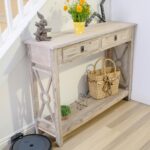 Stylish home entryway featuring a robotic vacuum cleaner and rustic decor.