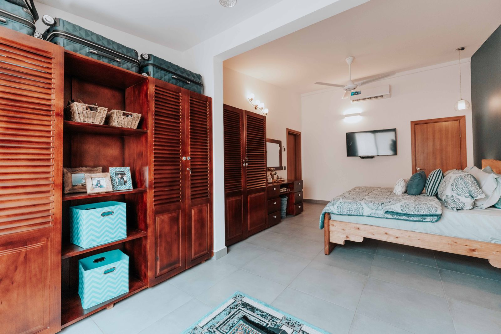 Organized small bedroom with under-bed storage space